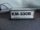 melco_km-330b